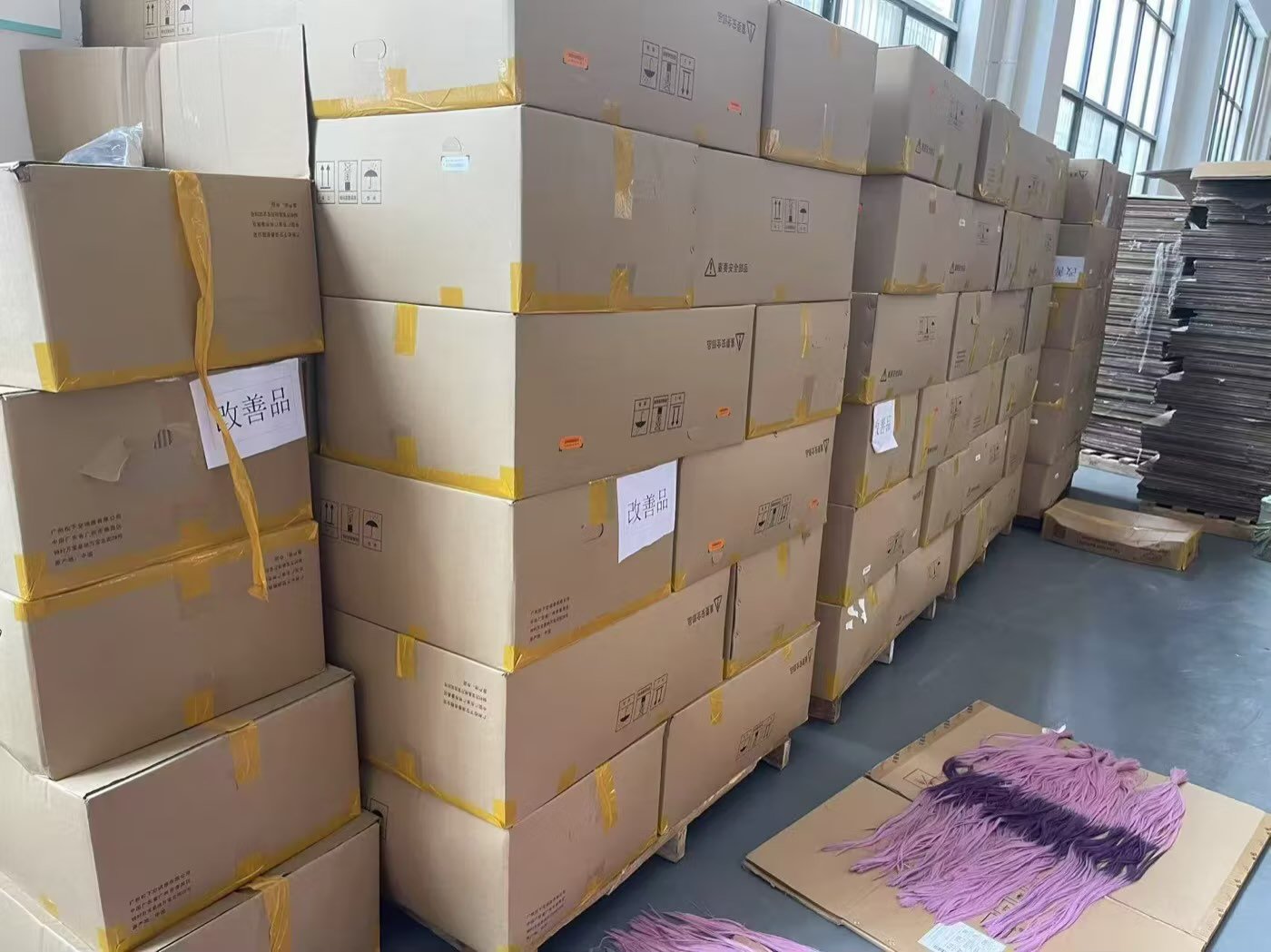 Pre-dispatch area at a cooperating production partner